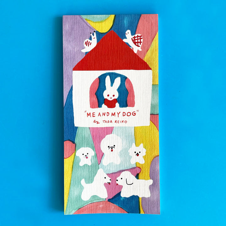 A  colorful "me and my dog" Memo pad on a blue background