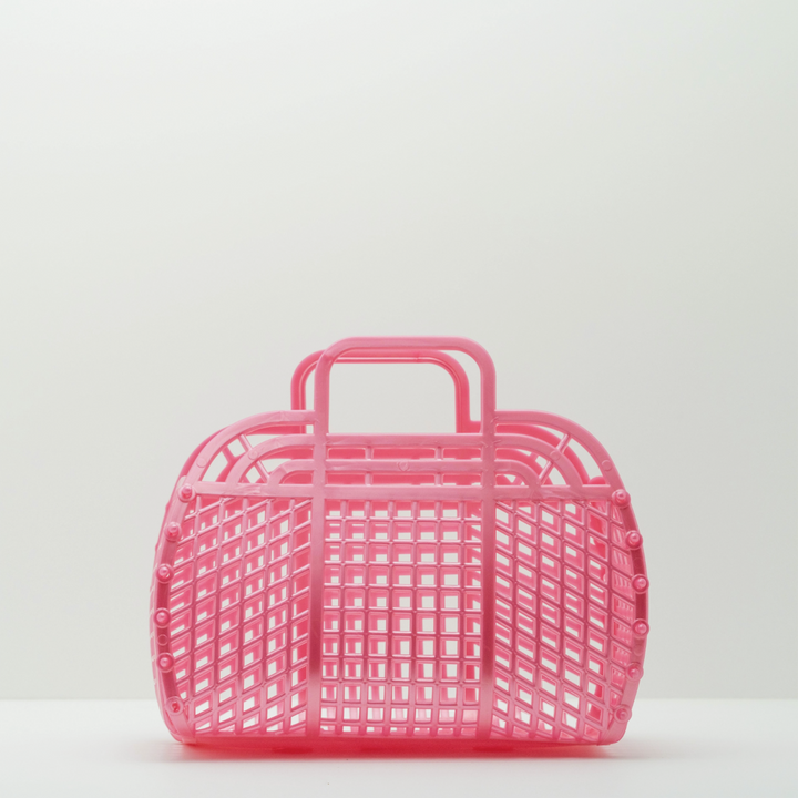 A medium, vintage-style jelly basket in bubblegum pink against a white background.
