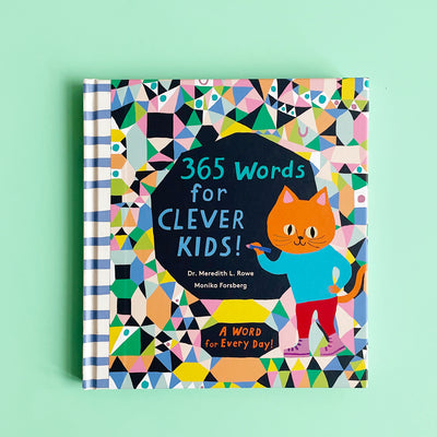 the book "365 words for clever kids" featuring an orange cat on its patterned front cover