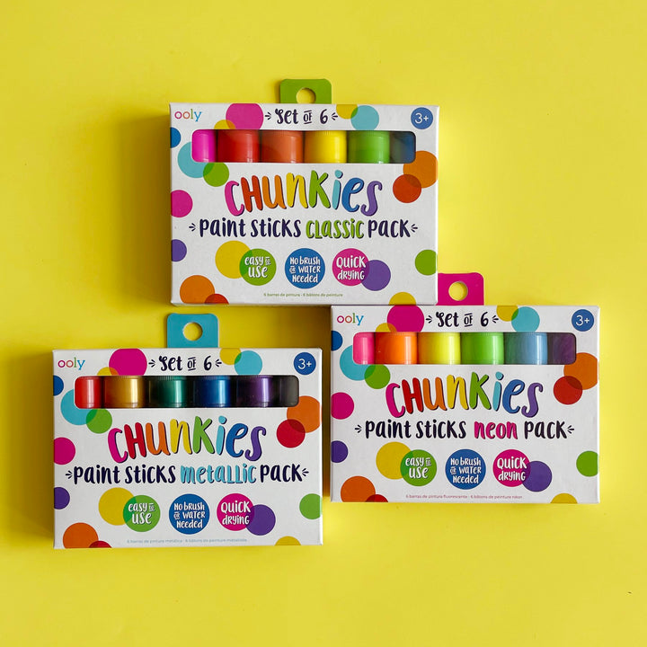 Three packages of Chunkies paint sticks on a yellow background.