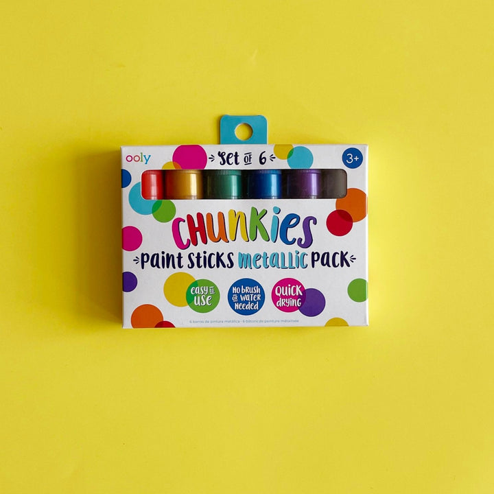 Chunkies paint sticks on a yellow background.