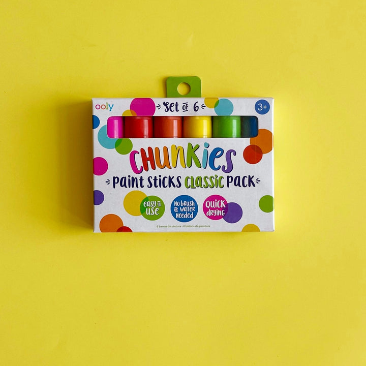 Chunkies paint sticks on a yellow background.