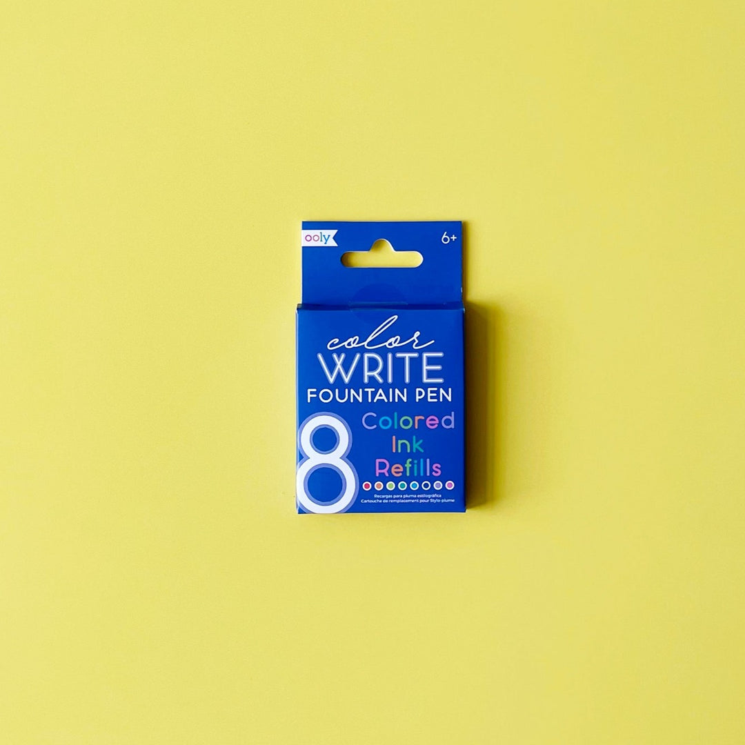 Package of Colored Ink Refills by Ooly displayed on a bright yellow background.