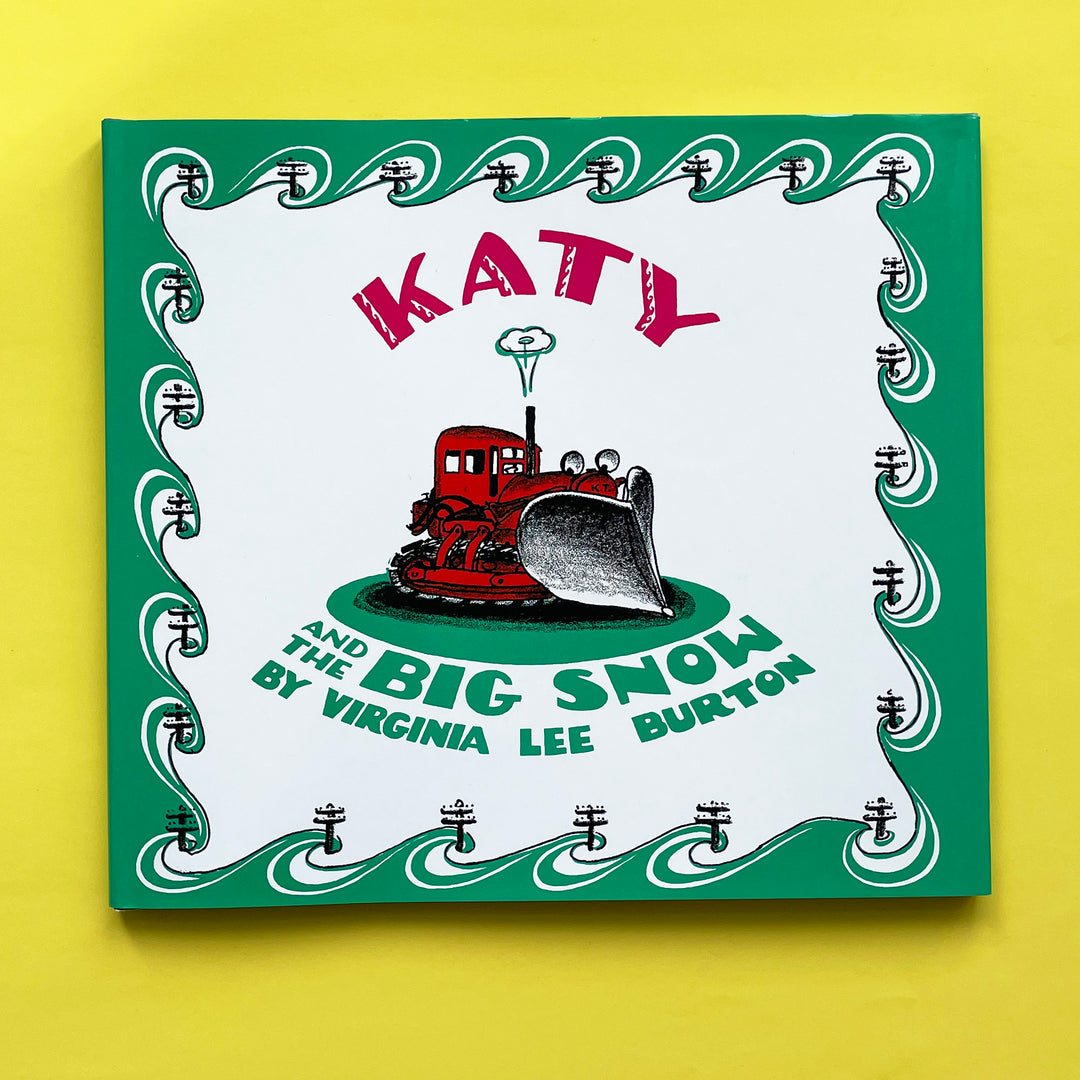 A copy of the book "Katy and the Big Snow". The cover featured an illustration of a red tractor with green, white and black accents. 