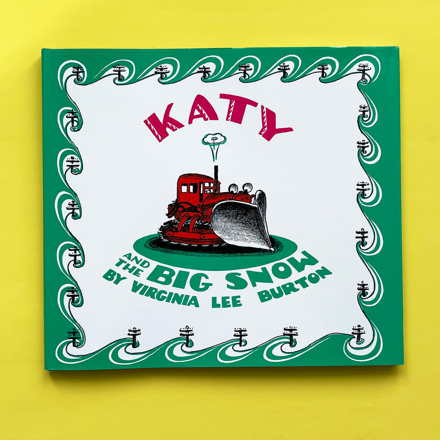 A copy of the book "Katy and the Big Snow". The cover featured an illustration of a red tractor with green, white and black accents. 
