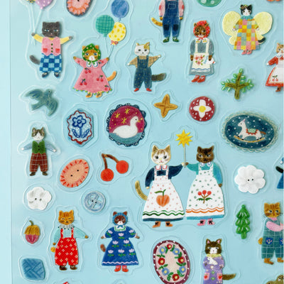 A close up of the translucent Cats sticker sheet featuring stickers of little cats holding balloons.