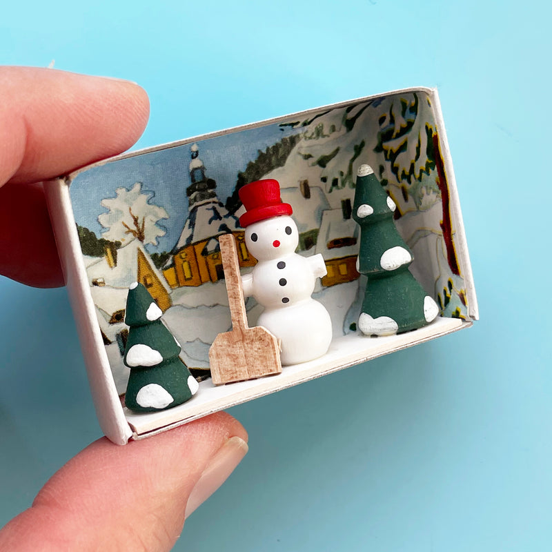 Snowman and Shovel Matchbox Scene