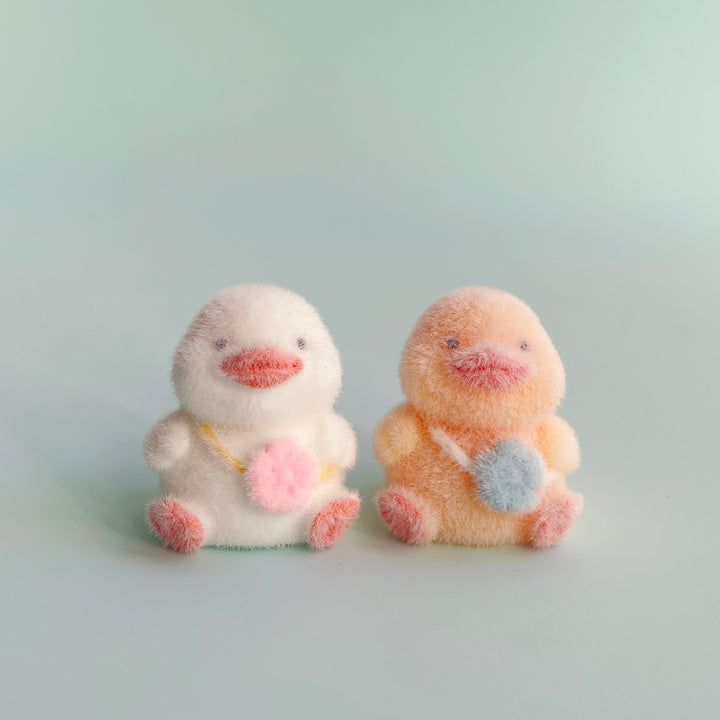 Tiny Flocked Ducks