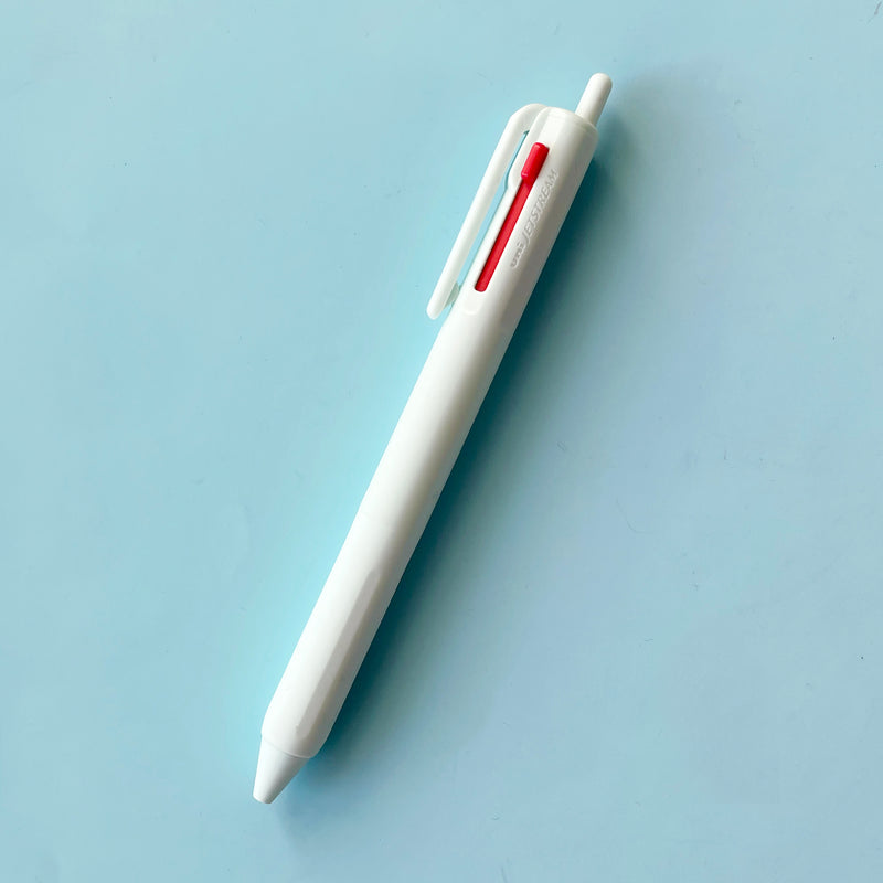 a light blue 3 Color Pen on a blue background