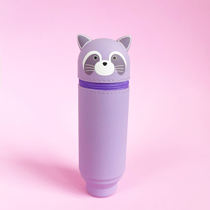 Purple raccoon-shaped container with a pink background