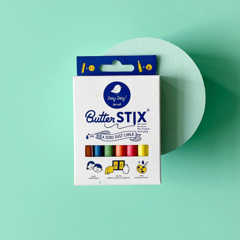 White box of Butter Stix chalk on a mint green background.