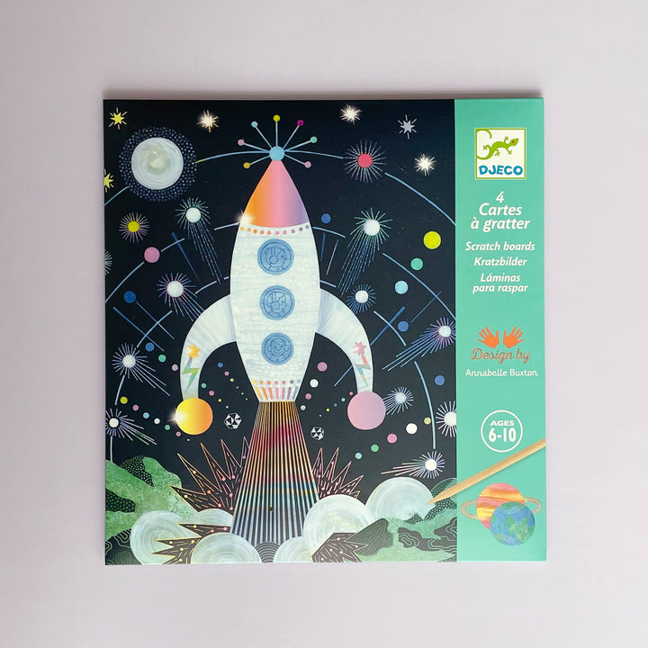 An flat box with an  illustration of a spaceship on a gray background. 